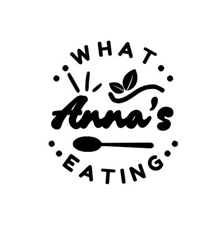 Logo showing website title What Anna's Eating, featuring a spoon